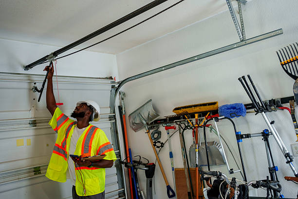 Professional Garage Door technician working in Spokane Valley, WA